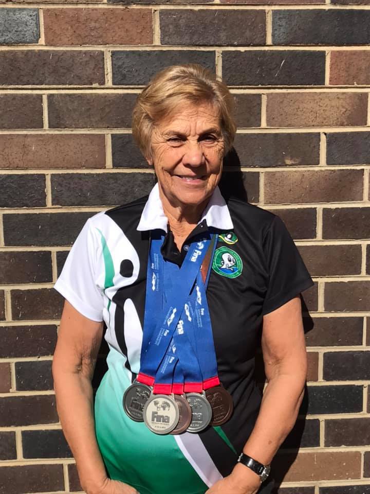 Annie with medals from Korea